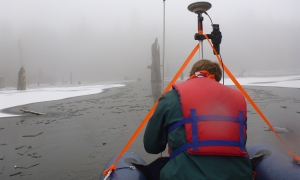 Bathymetric survey in zodiac in dense fog with surveyor
