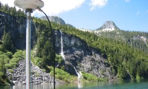 Bathymetric survey with waterfall and blue skies